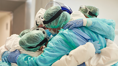 Thumbnail doctors nurses arms around